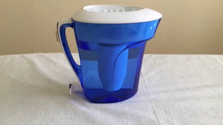 A picture containing indoor, cup, sitting, coffee Description automatically generated