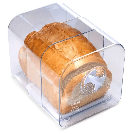 A picture containing table, sitting, food, cake Description automatically generated
