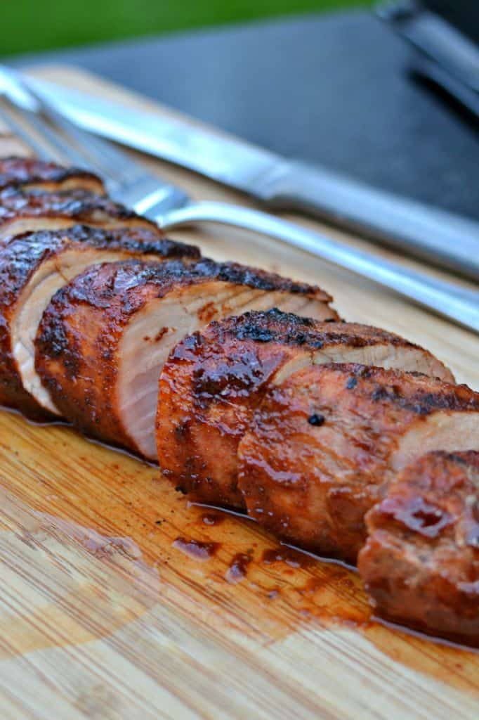 A piece of meat on a cutting board Description automatically generated